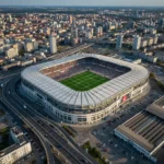 Série A Brasileira: Lições de Organização das Ligas Europeias Estádio europeu moderno e cheio durante um jogo, simbolizando a excelência organizacional.